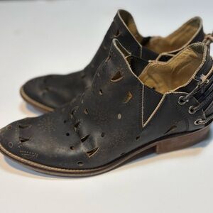 Musse & Cloud Anisse black leather ankle booties laser-cut cutouts low heel 12